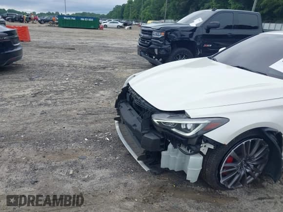 ✅ 2017 Infiniti Q60 Red Sport 400 • VIN: JN1FV7EK1HM610415 • Lot: 42493610. Listed on IAAI with 107,122 mi. Free auction sales archive from the USA and detailed vehicle history report at DreamBid. Image 6.