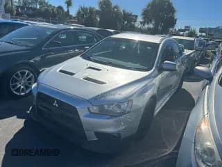 ✅ 2012 Mitsubishi Lancer Evolution GSR • VIN: JA32W8FV0CU025887 • Lot: 92743445. Wystawiony na Copart z przebiegiem 97 030 mil. Bezpłatny archiwum sprzedaży aukcyjnych z USA i szczegółowy raport historii pojazdu na DreamBid. Zdjęcie 2.