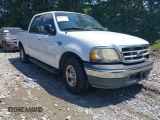 ✅ 2003 Ford F-150 XLT • VIN: 1FTRW07633KC39891 • Lot: 43013157. Listed on IAAI with 344,542 mi. Free auction sales archive from the USA and detailed vehicle history report at DreamBid. Image 1.