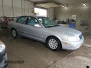 ✅ 2006 Kia Optima LX • VIN: KNAGD126665469273 • Lot: 70371855. Wystawiony na Copart z przebiegiem 238 021 mil. Bezpłatny archiwum sprzedaży aukcyjnych z USA i szczegółowy raport historii pojazdu na DreamBid. Zdjęcie 4.