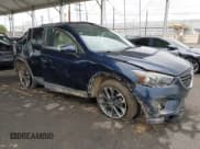 ✅ 2016 Mazda CX-5 Grand Touring • VIN: JM3KE2DY8G0885958 • Lot: 43369411. Wystawiony na IAAI z przebiegiem 171 093 mil. Bezpłatny archiwum sprzedaży aukcyjnych z USA i szczegółowy raport historii pojazdu na DreamBid. Zdjęcie 1.