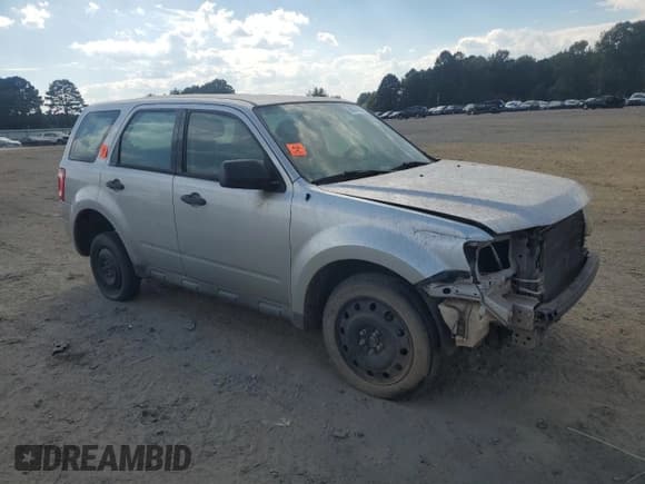 ✅ 2012 Ford Escape XLS • VIN: 1FMCU0C75CKA35597 • Lot: 86604185. Listed on Copart with 267,192 mi. Free auction sales archive from the USA and detailed vehicle history report at DreamBid. Image 4.