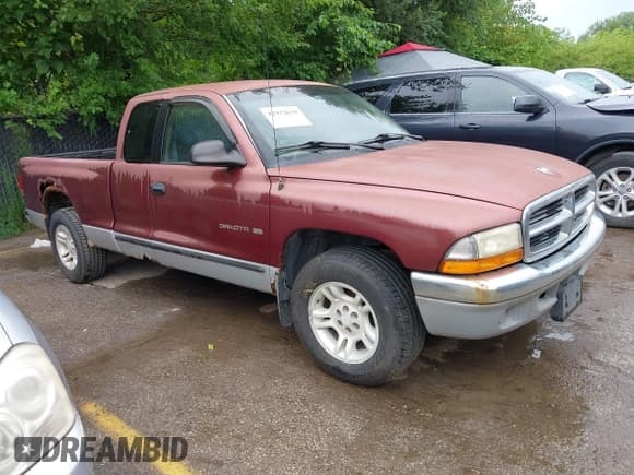 ✅ 2001 Dodge Dakota • VIN: 1B7GL22XX1S190262 • Lot: 42922639. Listed on IAAI with 142,990 mi. Free auction sales archive from the USA and detailed vehicle history report at DreamBid. Image 1.