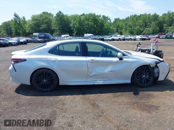2022 Toyota Camry XSE with VIN 4T1K61BK4NU059883, listed as a IAAI auction lot 42661757 with 14,193 mi miles and . Bid and sale history available at DreamBid. Image 17.