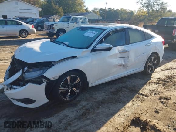 ✅ 2017 Honda Civic Touring • VIN: 19XFC1F90HE011533 • Lot: 43554429. Listed on IAAI with 112,255 mi. Free auction sales archive from the USA and detailed vehicle history report at DreamBid. Image 2.