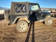 ✅ 2000 Jeep Wrangler Sport • VIN: 1J4FA49S9YP738234 • Lot: 91114555. Listed on Copart with 245,066 mi. Free auction sales archive from the USA and detailed vehicle history report at DreamBid. Image 3.