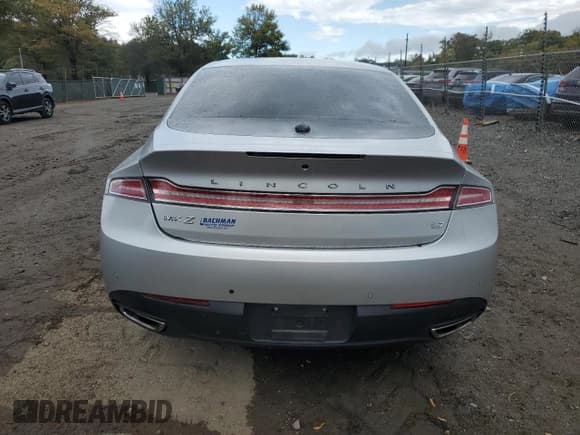 ✅ 2016 Lincoln MKZ • VIN: 3LN6L2GK1GR630717 • Lot: 85574925. Wystawiony na Copart z przebiegiem 109 827 mil. Bezpłatny archiwum sprzedaży aukcyjnych z USA i szczegółowy raport historii pojazdu na DreamBid. Zdjęcie 6.