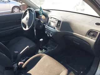 2009 Hyundai Accent Auto SE z VIN KMHCN36C19U109733, wystawiony jako IAAI lot #43153389 z przebiegiem 107 788 mil mil oraz . Historia ofert i sprzedaży dostępna na DreamBid. Obrazek 5.