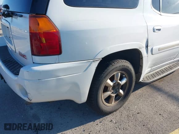 ✅ 2003 GMC Envoy SLT • VIN: 1GKES16S436243654 • Lot: 42186690. Listed on IAAI with 125,315 mi. Free auction sales archive from the USA and detailed vehicle history report at DreamBid. Image 14.