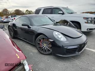 ✅ 2017 Porsche 911 Turbo S • VIN: WP0AD2A95HS167360 • Lot: 86816865. Wystawiony na Copart z przebiegiem 18 478 mil. Bezpłatny archiwum sprzedaży aukcyjnych z USA i szczegółowy raport historii pojazdu na DreamBid. Zdjęcie 4.