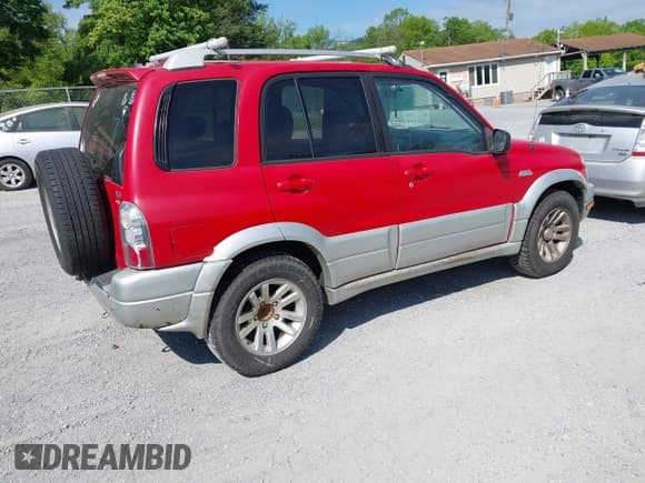 ✅ 2005 Suzuki Grand Vitara LX • VIN: JS3TD62VX54201211 • Lot: 42220221. Wystawiony na IAAI z przebiegiem 242 165 mil. Bezpłatny archiwum sprzedaży aukcyjnych z USA i szczegółowy raport historii pojazdu na DreamBid. Zdjęcie 4.