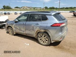 ✅ 2024 Toyota Corolla Cross Hybrid S • VIN: 7MUFBABG4RV058665 • Lot: 71464465. Listed on Copart with 25,597 mi. Free auction sales archive from the USA and detailed vehicle history report at DreamBid. Image 2.