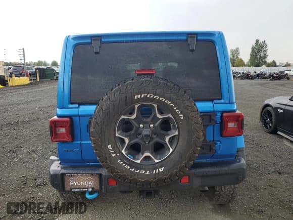 ✅ 2022 Jeep Wrangler Unlimited Rubicon • VIN: 1C4JJXR67NW107181 • Лот: 70259345. Опубликован ранее на Copart с пробегом 26 013 миль. Бесплатный доступ к архиву аукционных продаж из США и подробный отчёт об истории автомобиля на DreamBid. Изображение 6.