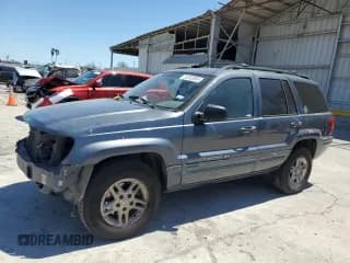 ✅ 2004 Jeep Grand Cherokee Laredo • VIN: 1J4GX48N54C371073 • Lot: 52202855. Listed on Copart with 212,368 mi. Free auction sales archive from the USA and detailed vehicle history report at DreamBid. Image 1.