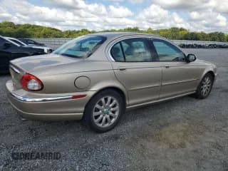 ✅ 2003 Jaguar X-Type 2.5L Manual • VIN: SAJEA51D93XD03179 • Лот: 72574844. Опубликован ранее на Copart с пробегом 134 414 миль. Бесплатный доступ к архиву аукционных продаж из США и подробный отчёт об истории автомобиля на DreamBid. Изображение 3.