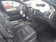 ✅ 2014 Jeep Grand Cherokee Overland • VIN: 1C4RJFCG6EC211600 • Lot: 43289489. Listed on IAAI with 133,935 mi. Free auction sales archive from the USA and detailed vehicle history report at DreamBid. Image 5.