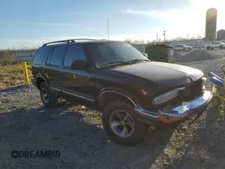 ✅ 1999 Chevrolet Blazer LS • VIN: 1GNCS13W7X2131753 • Lot: 46428975. Wystawiony na Copart z przebiegiem 161 307 mil. Bezpłatny archiwum sprzedaży aukcyjnych z USA i szczegółowy raport historii pojazdu na DreamBid. Zdjęcie 4.
