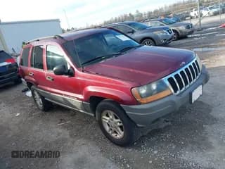 ✅ 2002 Jeep Grand Cherokee • VIN: 1J8GX48S22C167963 • Lot: 41277957. Listed on IAAI with 191,809 mi. Free auction sales archive from the USA and detailed vehicle history report at DreamBid. Image 1.