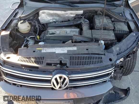✅ 2017 Volkswagen Tiguan S • VIN: WVGAV7AX3HK016148 • Lot: 85882155. Listed on Copart with 94,613 mi. Free auction sales archive from the USA and detailed vehicle history report at DreamBid. Image 12.