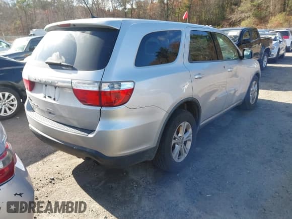 ✅ 2012 Dodge Durango SXT • VIN: 1C4RDJAG9CC112313 • Lot: 43709220. Listed on IAAI with 148,676 mi. Free auction sales archive from the USA and detailed vehicle history report at DreamBid. Image 4.