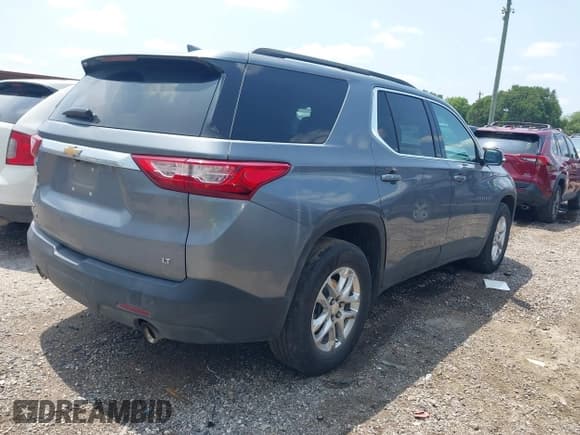 ✅ 2021 Chevrolet Traverse LT Cloth • VIN: 1GNERGKW4MJ182329 • Лот: 42351536. Опубликован ранее на IAAI с пробегом 95 279 миль. Бесплатный доступ к архиву аукционных продаж из США и подробный отчёт об истории автомобиля на DreamBid. Изображение 4.