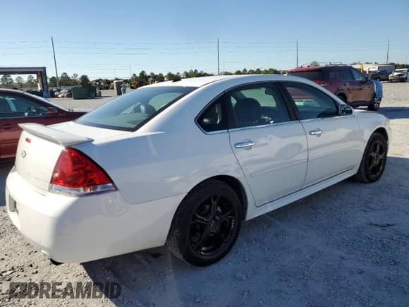 ✅ 2013 Chevrolet Impala LTZ • VIN: 2G1WC5E38D1215761 • Lot: 90534035. Listed on Copart with 205,467 mi. Free auction sales archive from the USA and detailed vehicle history report at DreamBid. Image 3.