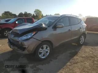 2011 Hyundai Tucson GLS z VIN KM8JU3AC3BU292656, wystawiony jako Copart lot #84770755 z przebiegiem 157 911 mil mil oraz Szkoda całkowita • Salvage title. Historia ofert i sprzedaży dostępna na DreamBid. Obrazek 1.