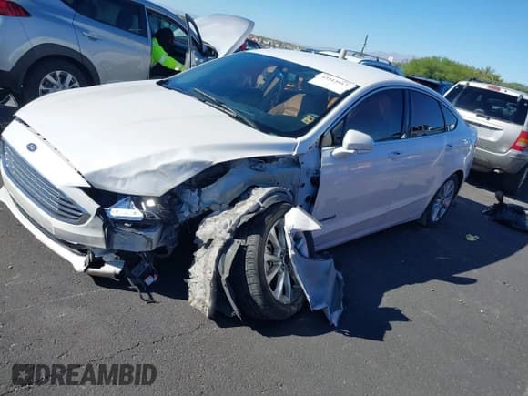 ✅ 2017 Ford Fusion Hybrid SE • VIN: 3FA6P0LU5HR157917 • Лот: 43513917. Опубликован ранее на IAAI с пробегом 132 718 миль. Бесплатный доступ к архиву аукционных продаж из США и подробный отчёт об истории автомобиля на DreamBid. Изображение 6.