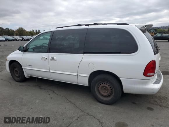 ✅ 2000 Dodge Caravan SE • VIN: 2B4GP44GXYR589372 • Лот: 82296735. Опубликован ранее на Copart с пробегом 276 759 миль. Бесплатный доступ к архиву аукционных продаж из США и подробный отчёт об истории автомобиля на DreamBid. Изображение 2.