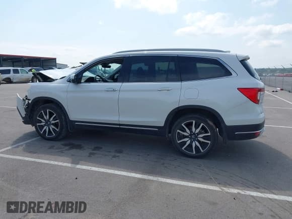 ✅ 2022 Honda Pilot Touring 7-Passenger • VIN: 5FNYF6H62NB078544 • Лот: 42913308. Опубликован ранее на IAAI с пробегом 39 197 миль. Бесплатный доступ к архиву аукционных продаж из США и подробный отчёт об истории автомобиля на DreamBid. Изображение 14.