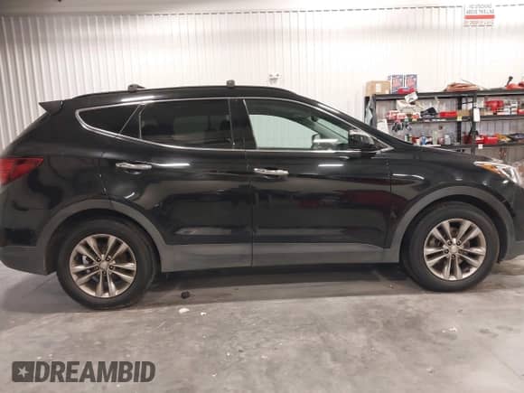 2017 Hyundai Santa Fe 2.0T z VIN 5XYZUDLA9HG433491, wystawiony jako IAAI lot #43298379 z przebiegiem 135 099 mil mil oraz . Historia ofert i sprzedaży dostępna na DreamBid. Obrazek 13.