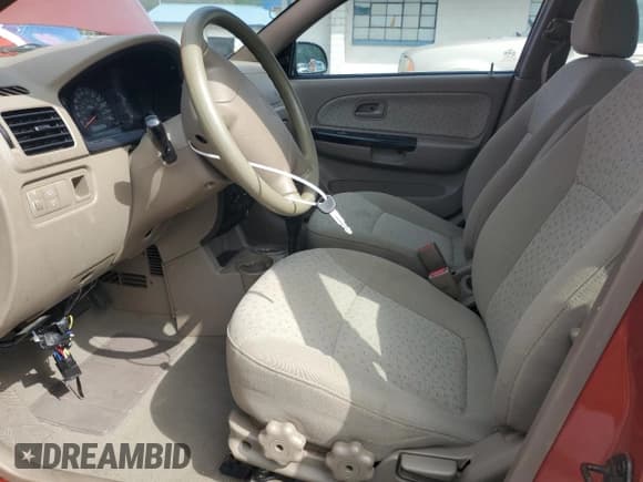 ✅ 2003 Kia Rio • VIN: KNADC165436125986 • Lot: 63500705. Wystawiony na Copart z przebiegiem 88 273 mil. Bezpłatny archiwum sprzedaży aukcyjnych z USA i szczegółowy raport historii pojazdu na DreamBid. Zdjęcie 7.