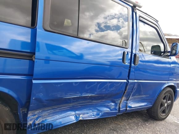 ✅ 2002 Volkswagen EuroVan MV • VIN: WV2NB47002H005993 • Lot: 41568379. Listed on IAAI with 143,133 mi. Free auction sales archive from the USA and detailed vehicle history report at DreamBid. Image 6.