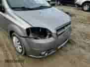 2009 Chevrolet Aveo 2LT z VIN KL1TG56E29B395364, wystawiony jako Copart lot #85162004 z przebiegiem 166 094 mil mil oraz Szkoda całkowita • Salvage title. Historia ofert i sprzedaży dostępna na DreamBid. Obrazek 11.