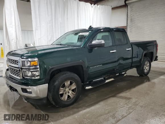 ✅ 2015 Chevrolet Silverado 1500 LT • VIN: 1GCVKREH3FZ156024 • Lot: 92626465. Listed on Copart with 105,652 mi. Free auction sales archive from the USA and detailed vehicle history report at DreamBid. Image 1.