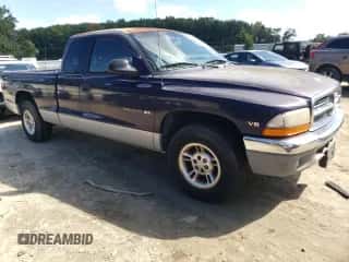 1999 Dodge Dakota SLT z VIN 1B7GL22X6XS225162, wystawiony jako Copart lot #74579884 z przebiegiem 162 714 mil mil oraz Czysty tytuł • Clean title. Historia ofert i sprzedaży dostępna na DreamBid. Obrazek 4.