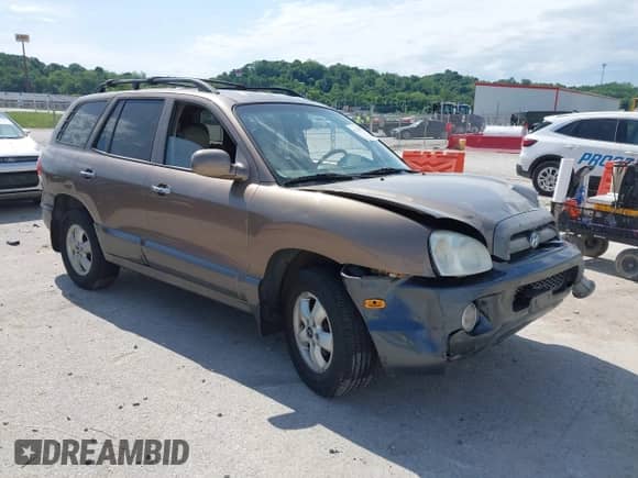 2005 Hyundai Santa Fe GLS z VIN KM8SC73E75U938928, wystawiony jako IAAI lot #42298752 z przebiegiem 147 476 mil mil oraz . Historia ofert i sprzedaży dostępna na DreamBid. Obrazek 1.