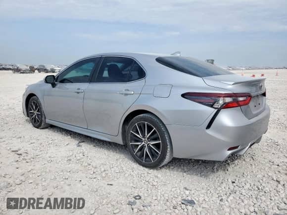 2023 Toyota Camry SE с VIN 4T1G11AK0PU720138, выставлен на аукционе Copart как лот 69443265 с пробегом 93 940 миль миль и Чистый • Clean title. История ставок и продаж доступна на DreamBid. Изображение 2.