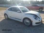 ✅ 2014 Volkswagen Beetle 2.5L • VIN: 3VWJP7AT4EM612561 • Лот: 92345045. Опубликован ранее на Copart с пробегом 122 635 миль. Бесплатный доступ к архиву аукционных продаж из США и подробный отчёт об истории автомобиля на DreamBid. Изображение 4.