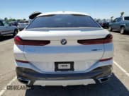 ✅ 2023 BMW X6 xDrive40i • VIN: 5UXCY6C00P9N62599 • Лот: 64871833. Опубликован ранее на Copart с пробегом 20 319 миль. Бесплатный доступ к архиву аукционных продаж из США и подробный отчёт об истории автомобиля на DreamBid. Изображение 6.