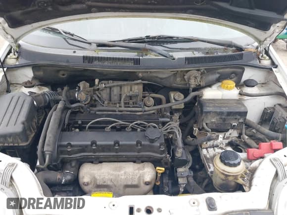 ✅ 2004 Chevrolet Aveo LS • VIN: KL1TJ52684B130635 • Lot: 41442869. Wystawiony na IAAI z przebiegiem 199 586 mil. Bezpłatny archiwum sprzedaży aukcyjnych z USA i szczegółowy raport historii pojazdu na DreamBid. Zdjęcie 10.