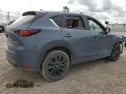 ✅ 2021 Mazda CX-5 Carbon Edition • VIN: JM3KFACM4M0473022 • Lot: 46983515. Wystawiony na Copart z przebiegiem Nie podano. Bezpłatny archiwum sprzedaży aukcyjnych z USA i szczegółowy raport historii pojazdu na DreamBid. Zdjęcie 3.