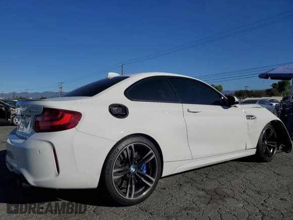 ✅ 2017 BMW M2 • VIN: WBS1H9C31HV887767 • Lot: 81957614. Listed on Copart with 53,284 mi. Free auction sales archive from the USA and detailed vehicle history report at DreamBid. Image 3.
