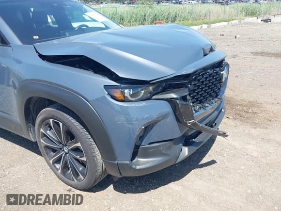 ✅ 2023 Mazda CX-50 S Premium Plus • VIN: 7MMVABEM3PN152314 • Lot: 42571147. Wystawiony na IAAI z przebiegiem 17 703 mil. Bezpłatny archiwum sprzedaży aukcyjnych z USA i szczegółowy raport historii pojazdu na DreamBid. Zdjęcie 6.