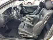 ✅ 2007 BMW 6 Series 650i • VIN: WBAEH13517CR52037 • Лот: 80124315. Опубликован ранее на Copart с пробегом 104 702 миль. Бесплатный доступ к архиву аукционных продаж из США и подробный отчёт об истории автомобиля на DreamBid. Изображение 7.