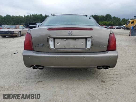 ✅ 2000 Cadillac DeVille • VIN: 1G6KF5794YU249059 • Lot: 71614494. Listed on Copart with 121,611 mi. Free auction sales archive from the USA and detailed vehicle history report at DreamBid. Image 6.