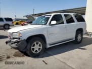 ✅ 2001 GMC Yukon Denali • VIN: 1GKEK63U61J186208 • Lot: 70895394. Listed on Copart with 207,395 mi. Free auction sales archive from the USA and detailed vehicle history report at DreamBid. Image 1.