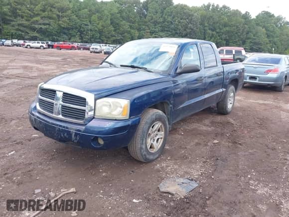 2006 Dodge Dakota SLT with VIN 1D7HE48N26S703484, listed as a IAAI auction lot 42974866 with 253,328 mi miles and . Bid and sale history available at DreamBid. Image 2.