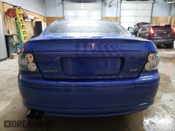 ✅ 2004 Pontiac GTO • VIN: 6G2VX12G94L209153 • Lot: 77960994. Listed on Copart with 52,868 mi. Free auction sales archive from the USA and detailed vehicle history report at DreamBid. Image 6.