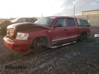 2010 Dodge Dakota SXT z VIN 1D7CW3GP5AS132893, wystawiony jako Copart lot #81502524 z przebiegiem 256 032 mil mil oraz Czysty tytuł • Clean title. Historia ofert i sprzedaży dostępna na DreamBid. Obrazek 1.